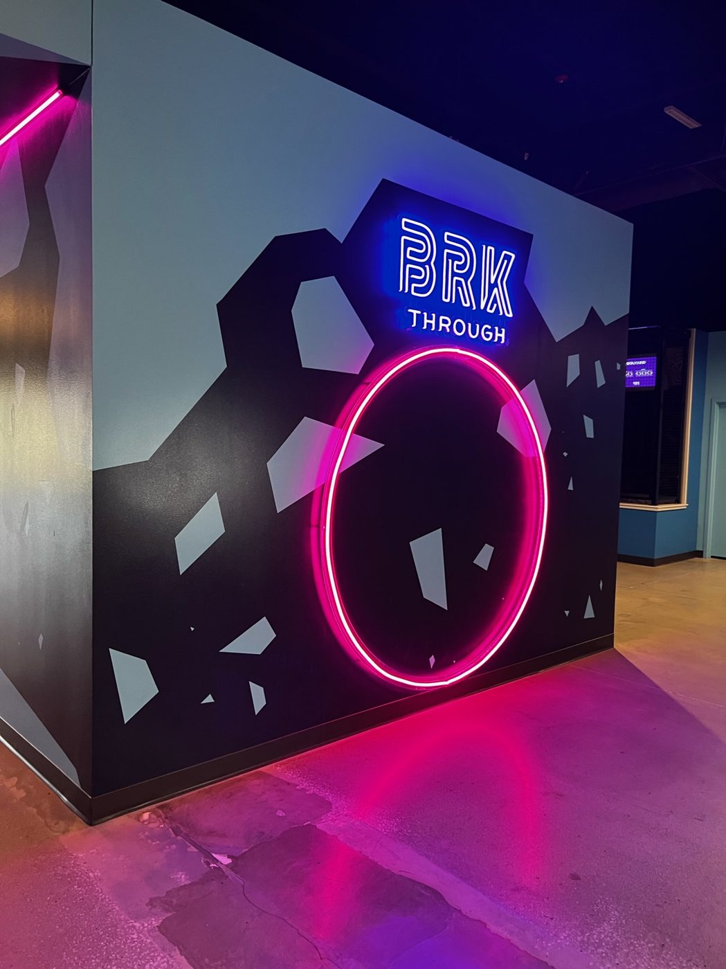Commercial paint work by Prestige Painting Worldwide — neon entertainment venue in Kansas City