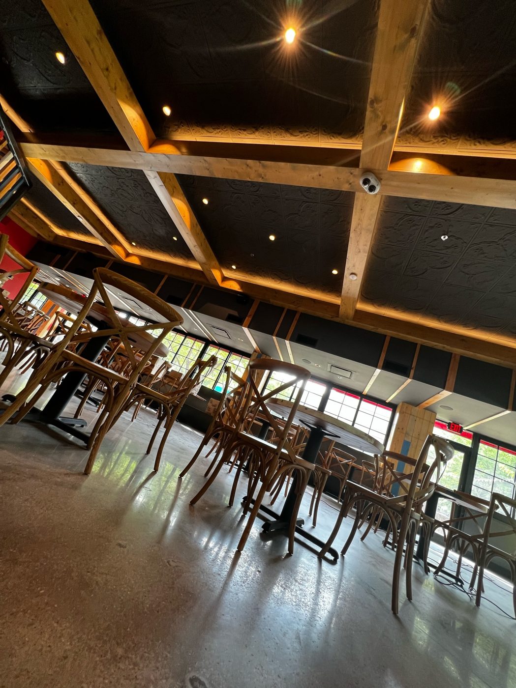 Venue interior with exposed beam ceiling